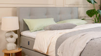 Boxspringbett Premium mit Stauraum von Bruno – in Hellgrau, Opus-Kopfteil
